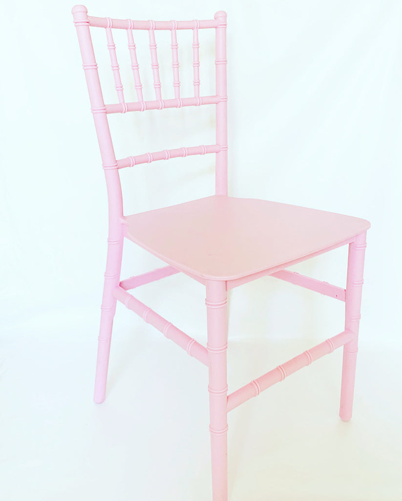 pink and wood chair