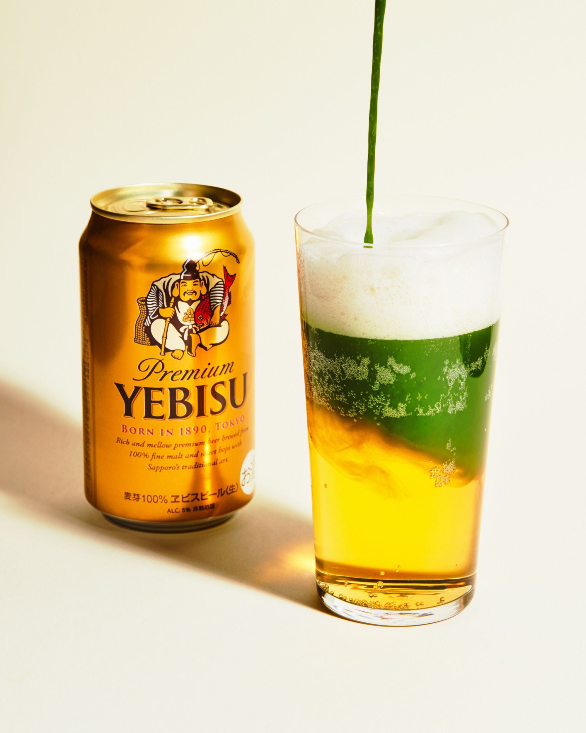 A matcha beer drink beside a beer can