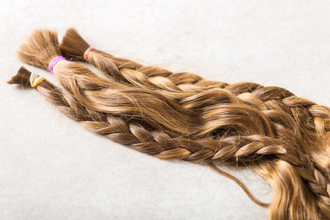 Three bundles of braided hair