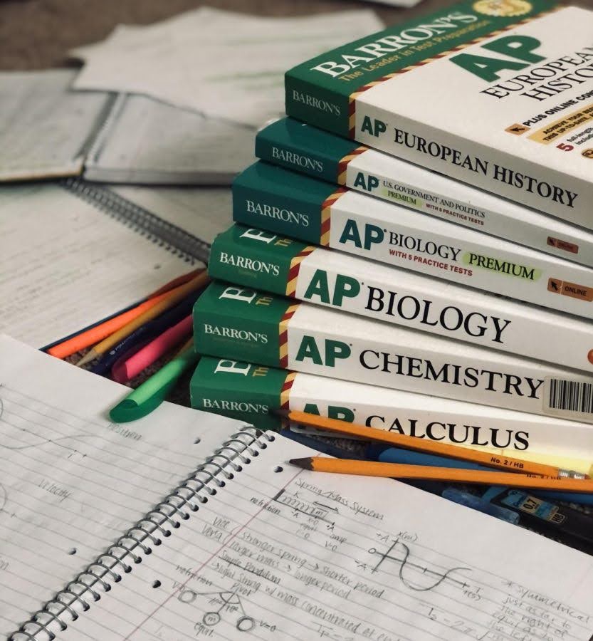stack of different paperback ap text books