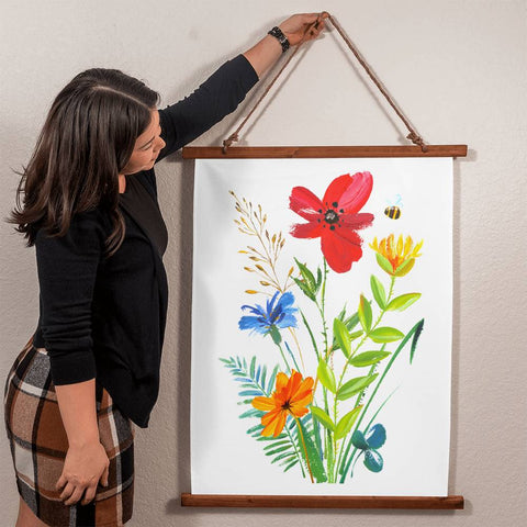 Wild Flowers Wood Framed Wall Tapestry. Constructed from soft, lightweight polyester with a wooden hanging system and features a unique, vibrantly printed design.