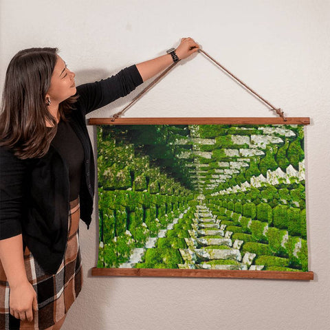 Moss Wood Framed Wall Tapestry. Constructed from soft, lightweight polyester with a wooden hanging system and features a unique, vibrantly printed design.