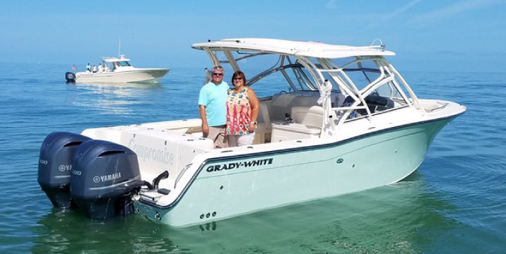 Two new boat owners on a Grady White, powered by twin Yamaha engines