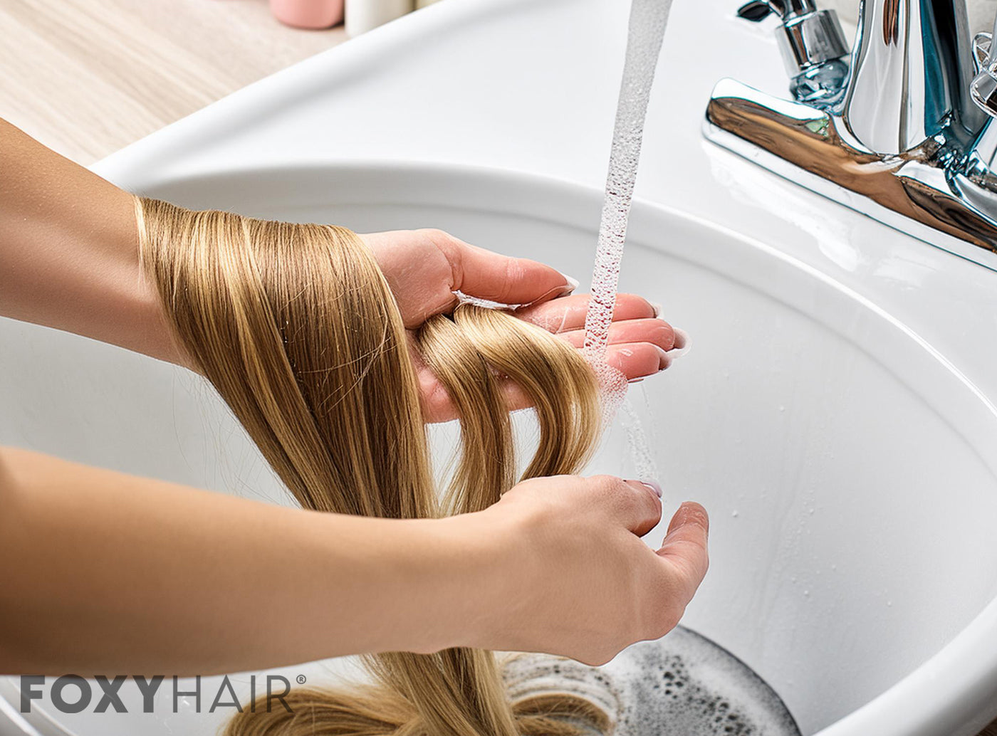 washing clip in hair extensions in sink