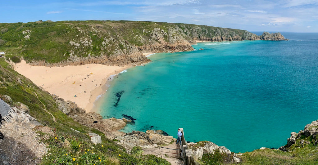 Paddle boarding Porthcurno Beach Cornwall