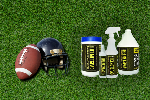 Disinfectant products used on a football chin strap for hygiene.