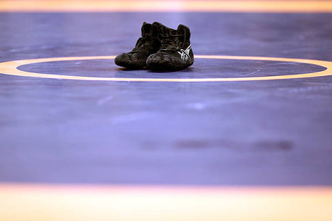 Close-up of various wrestling shoe materials including mesh, leather, and synthetic, essential for understanding how to clean wrestling shoes.