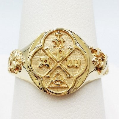 anillo religioso de oro amarillo