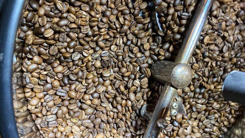 Roasted coffee in the cooling tank of the roaster.