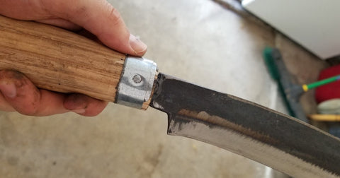 improvising a metal ferule for new wooden handle on parang machete