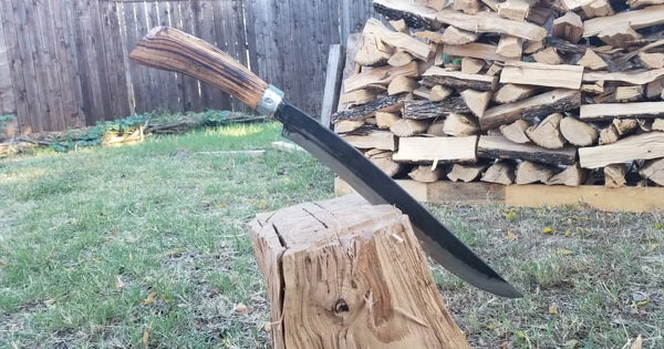 A new wooden handle for a parang machete 