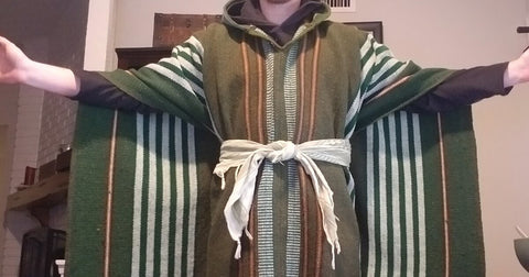 Half wrap of poncho gives you a layer of wool and a nifty cape