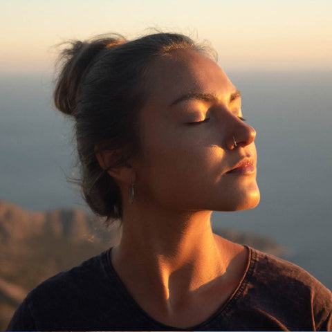 Woman soaking up the sunrays