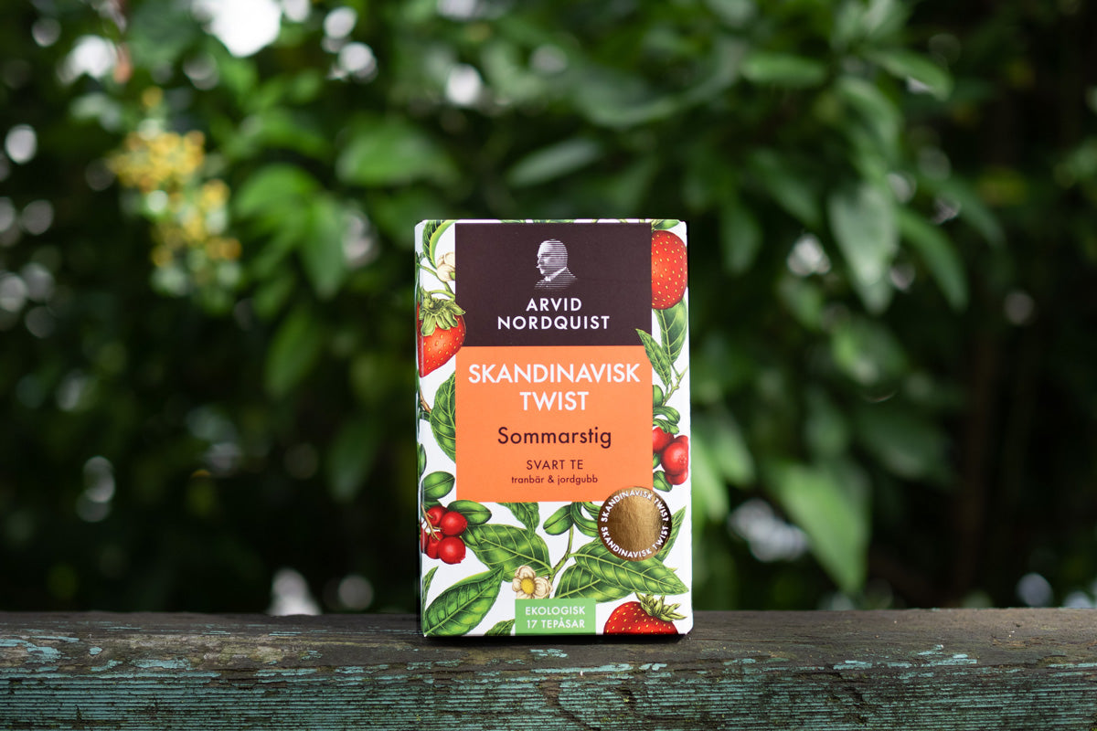 Package of Sommerstig (Summer Path), part of the SKANDINAVISK TWIST series of flavored teas created by ARVID NORDQUIST, a Scandinavian Swedish tea maker, with the theme of "Nordic nature"