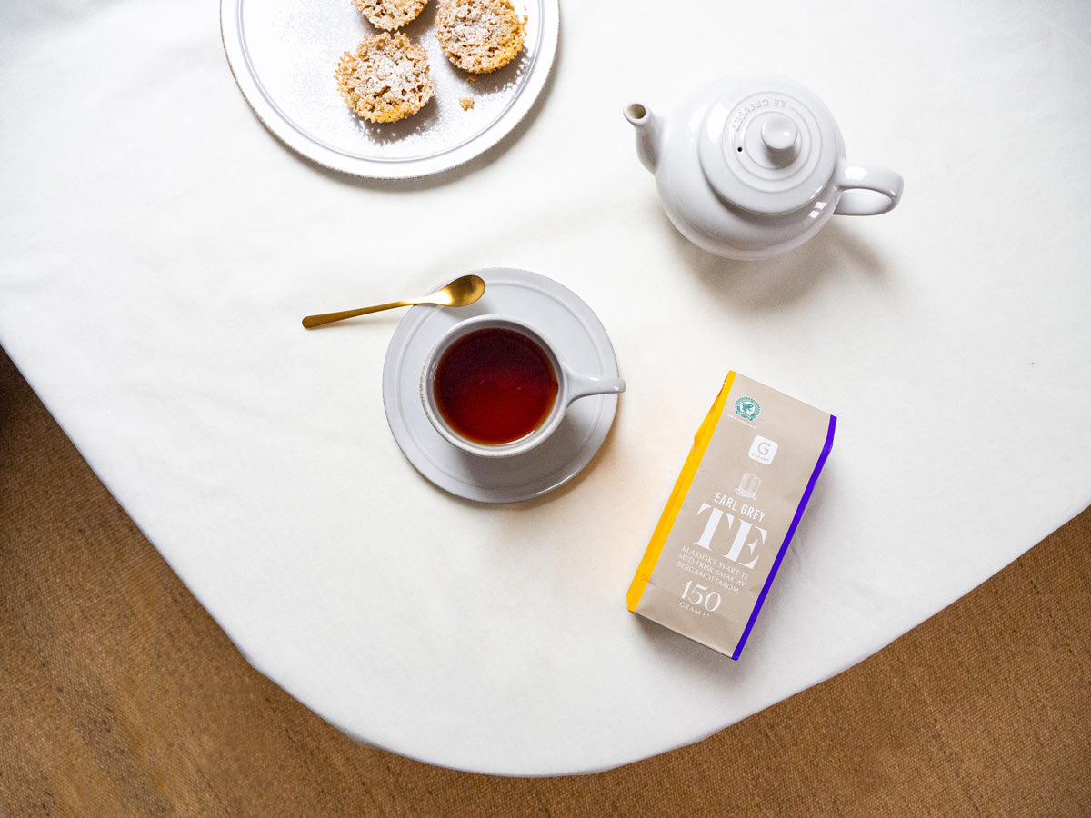 Fika with earl gray tea and cookies with a cute pop design from Scandinavian Swedish food manufacturer Garant
