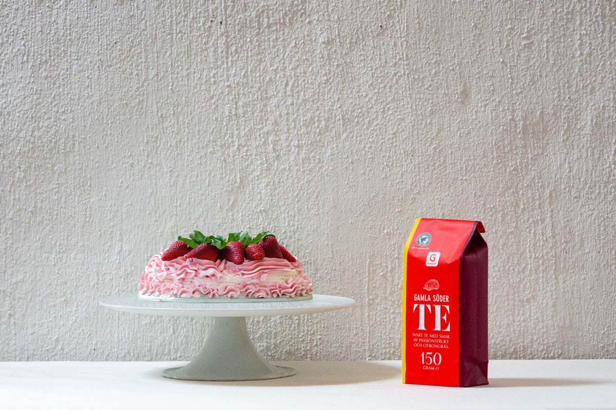 Fika with cute black tea Gamla Seder and strawberry cake with pop design from Scandinavian Swedish food manufacturer Garant