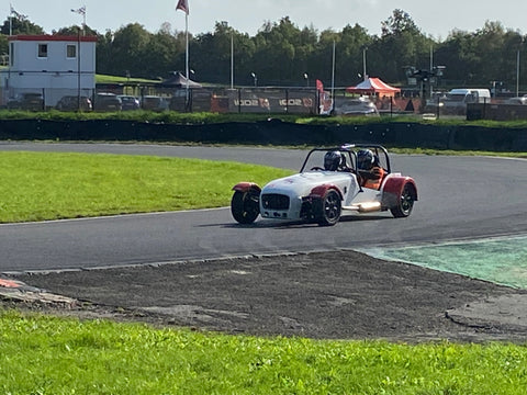 The car Hayley was driving at a distance, going around the track.