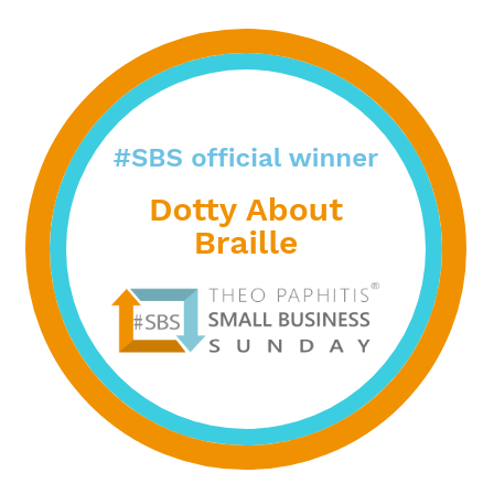 An orange and blue circle graphic with #SBS official winner, dotty about braille, #SBS Theo Paphitis Small Business Sunday written inside.