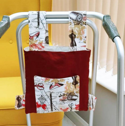 A Parisian themed fabric hung over a zimmer frame.