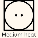 medium heat laundry symbol