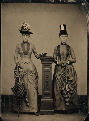 Photograph of 1880s women in their dresses and hats