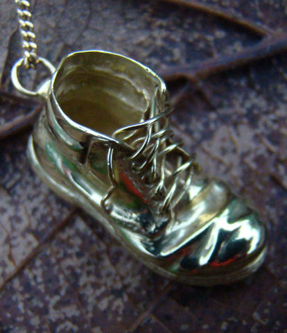 An 18ct gold boot, handcrafted by Elena Brennan Jewellery as a special commission.