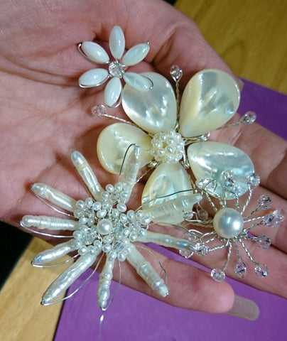 Flowers designs for floral bridal headpiece, bespoke jewelry made from pearls and sterling silver!