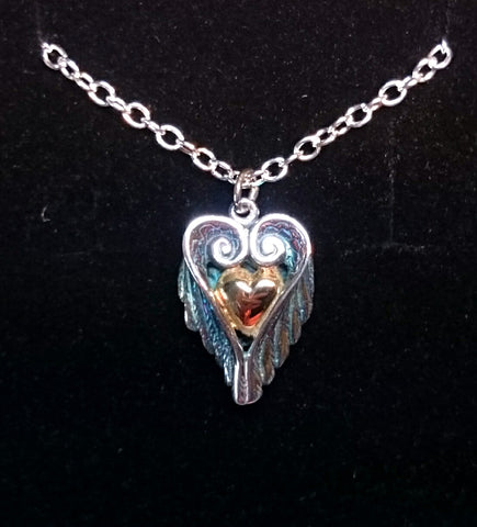 Delicate Bespoke Sterling Sliver Angel Heart and Wings Jewelry. Elena Brennan Jewellery