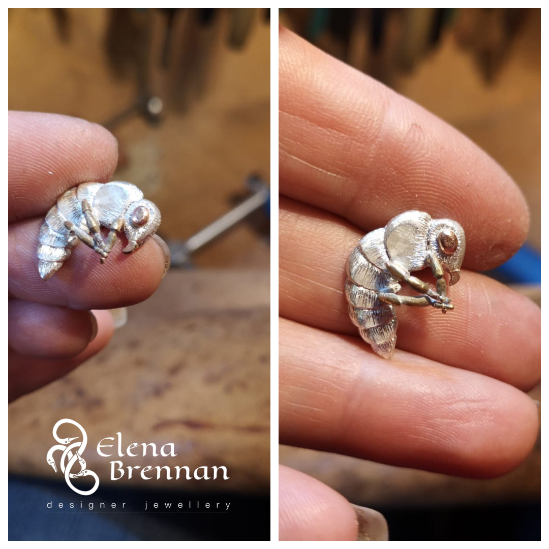 A closer look at the size of the Honey Bee Pendant, on Elena's fingers for scale.