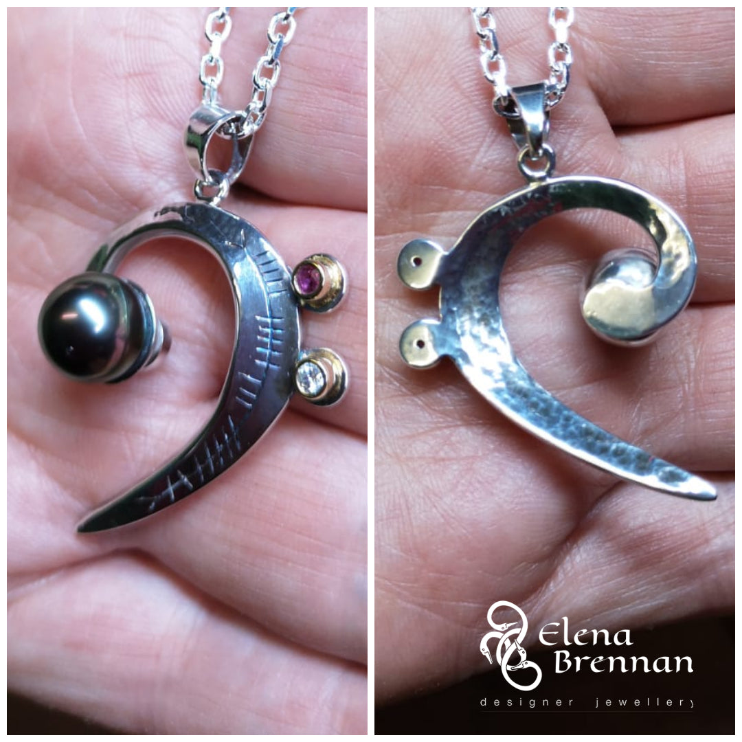 A closer look at the patinaed effect on the Tahitian Black Pearl Pendant.