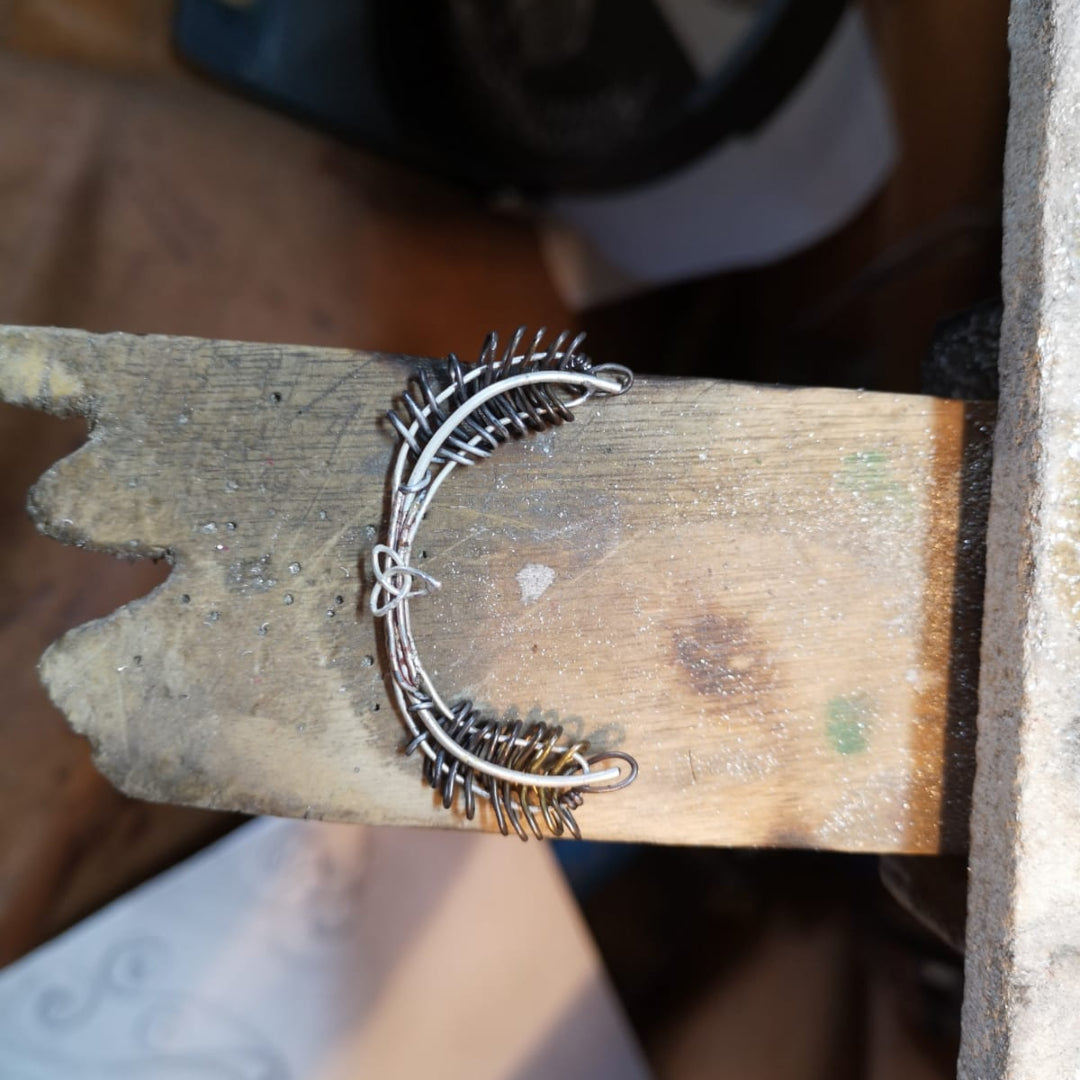 The Old Military Brooch is starting to take shape with a Tri-Spiral symbol.