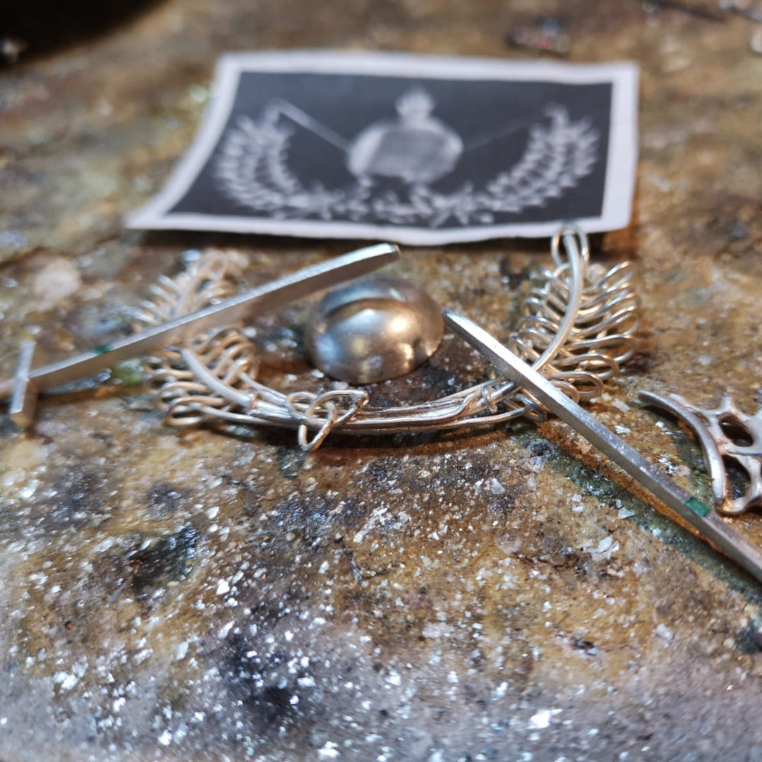 Placing the different elements of the bespoke Military Brooch before soldering together.