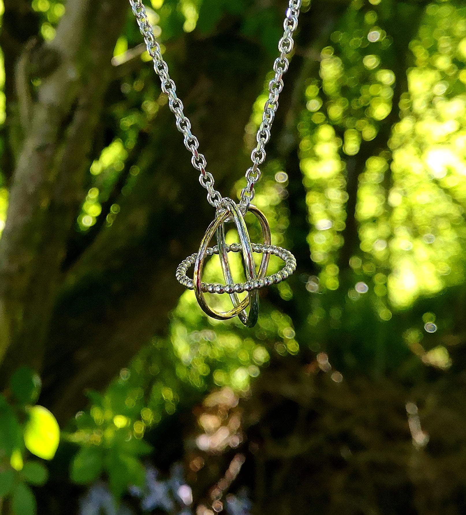 The Cúrsa an tSaoil Circles of Life pendant is handcrafted by Elena Brennan Jewellery.