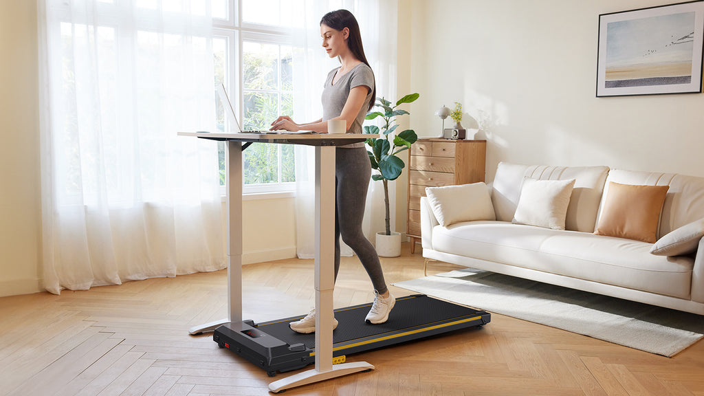 The Urevo Spacewalk E1 Treadmill features double shock absorption, quiet operation, and a compact, easily movable design, ideal for home or office workouts.
