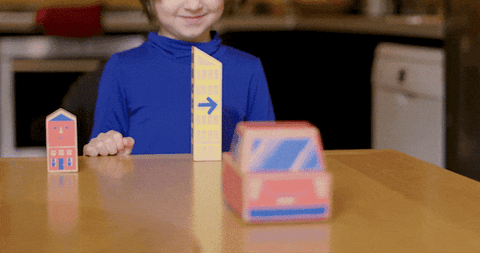 A gif of a young boy debugging an algorithm in real time