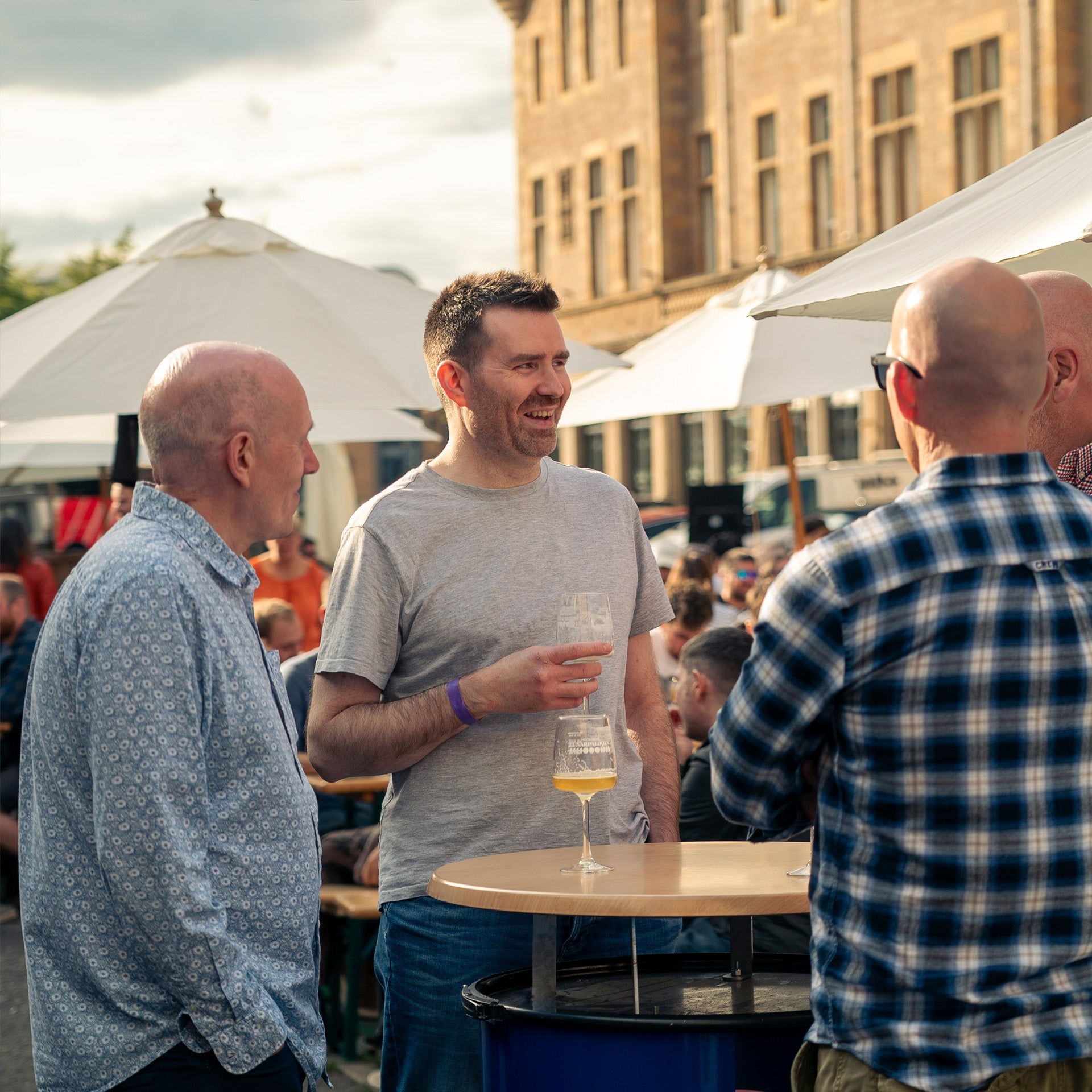 People smiling in the sun at Lunarpalooza beer festival