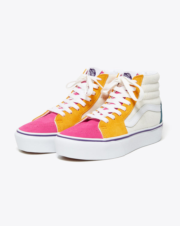 pink and white high top vans