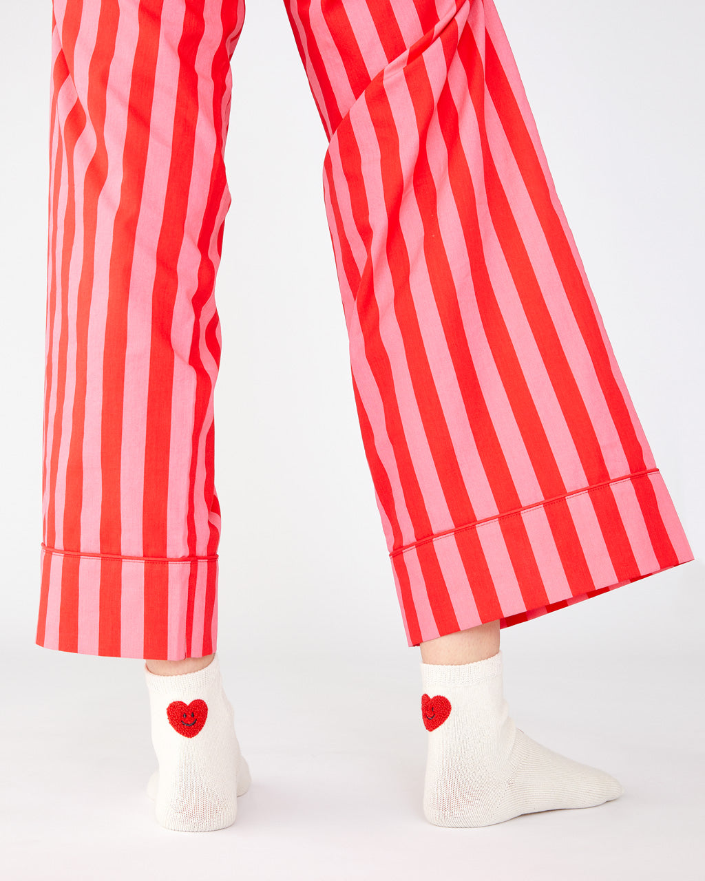 red pants with pink stripe
