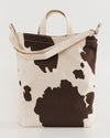 brown cow print duck bag
