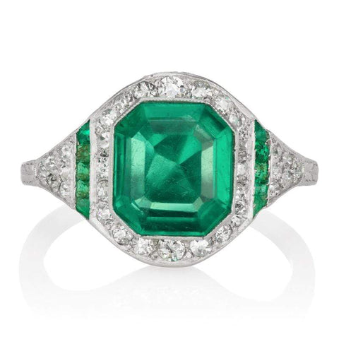 VINTAGE EMERALD HALO ENGAGEMENT RING