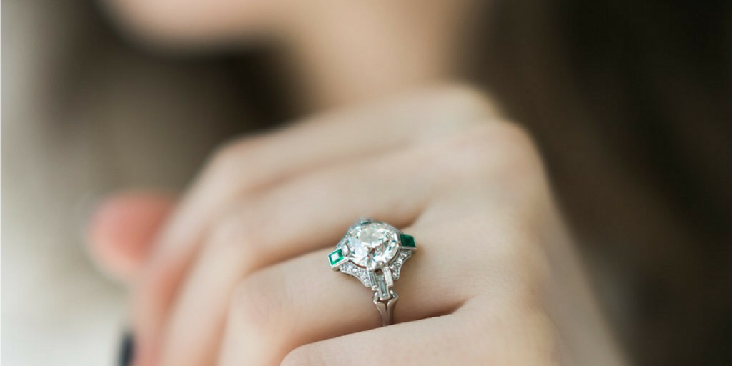 vintage engagement ring with side stones