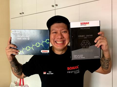 Davin Neo IDA Recognised Trainer holding Sonax EVO and CC36 Ceramic Coatings