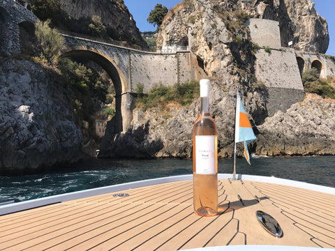 Funboy Rose Wine on the deck of a boat