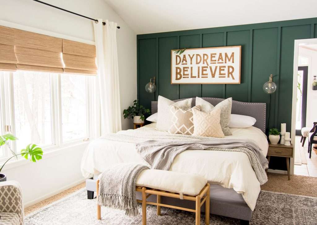Bedroom with deep hunter green accents