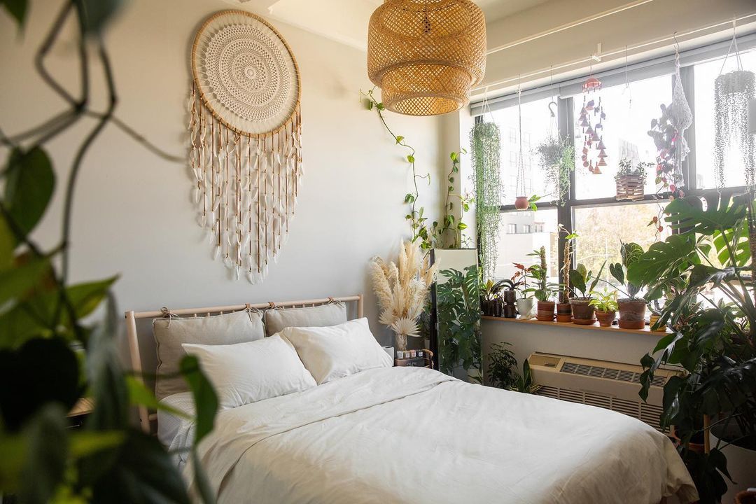 Bedroom with free-spirited boho elements like macramé and dreamcatchers