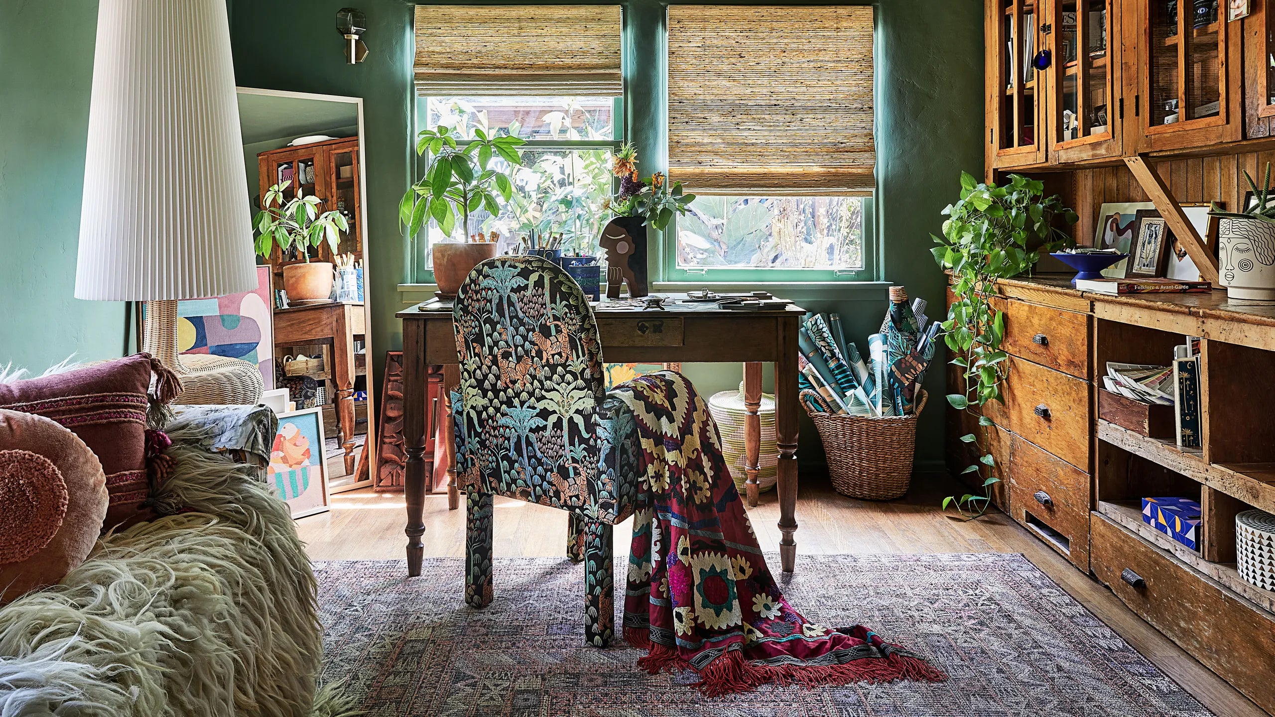 Global-inspired boho decor featuring rugs and textiles from various countries