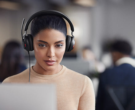 Woman using headset with busy light