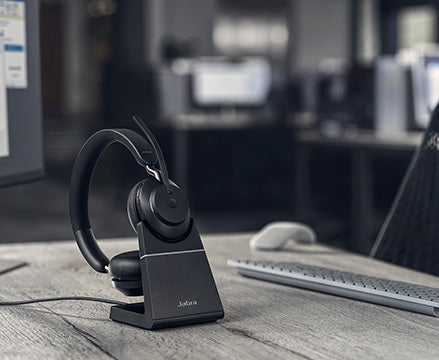 Jabra Evolve2 65 headset in charging stand