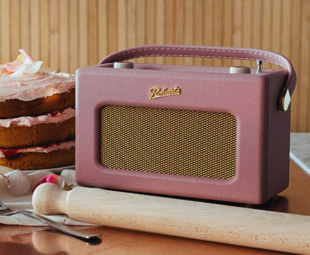 Pink Roberts radio next to rolling pin