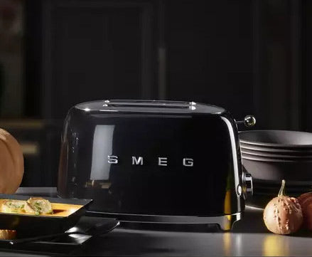 Black Smeg toaster on kitchen countertop